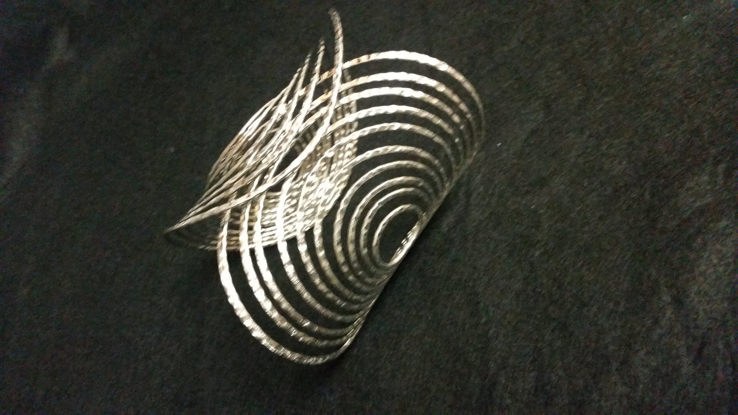 Zinc Spiral Cuffs